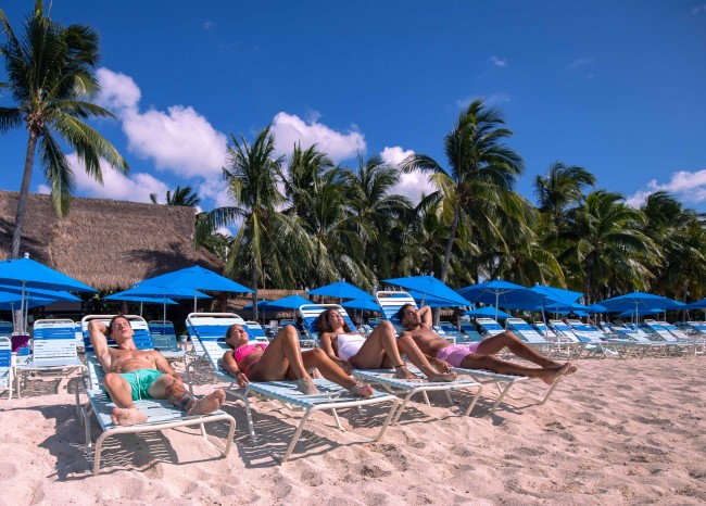 Lounge chair service beach club Cozumel